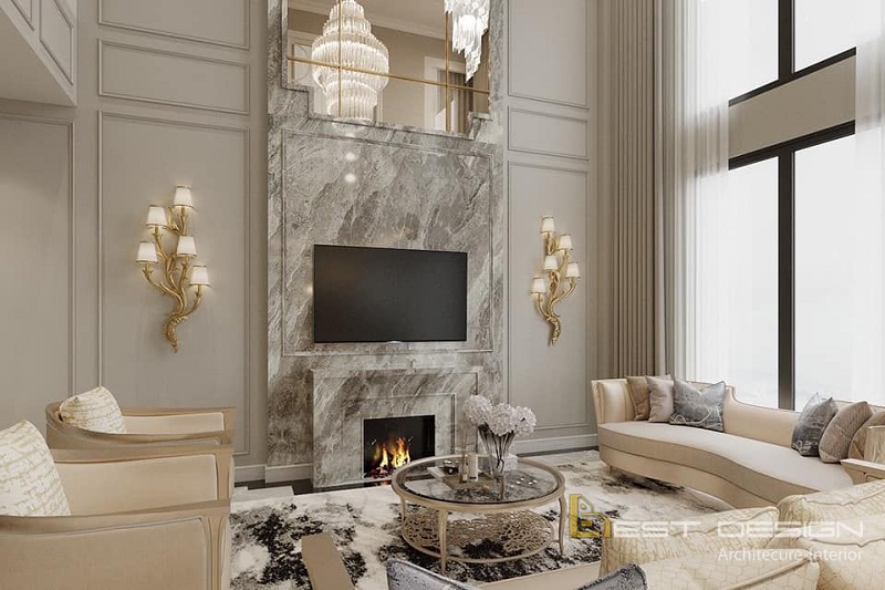Thiết kế tường ốp đá marble trang trọng cùng những đường phào chỉ đẹp mắt chiếu rọi bởi những ánh đèn lung linh